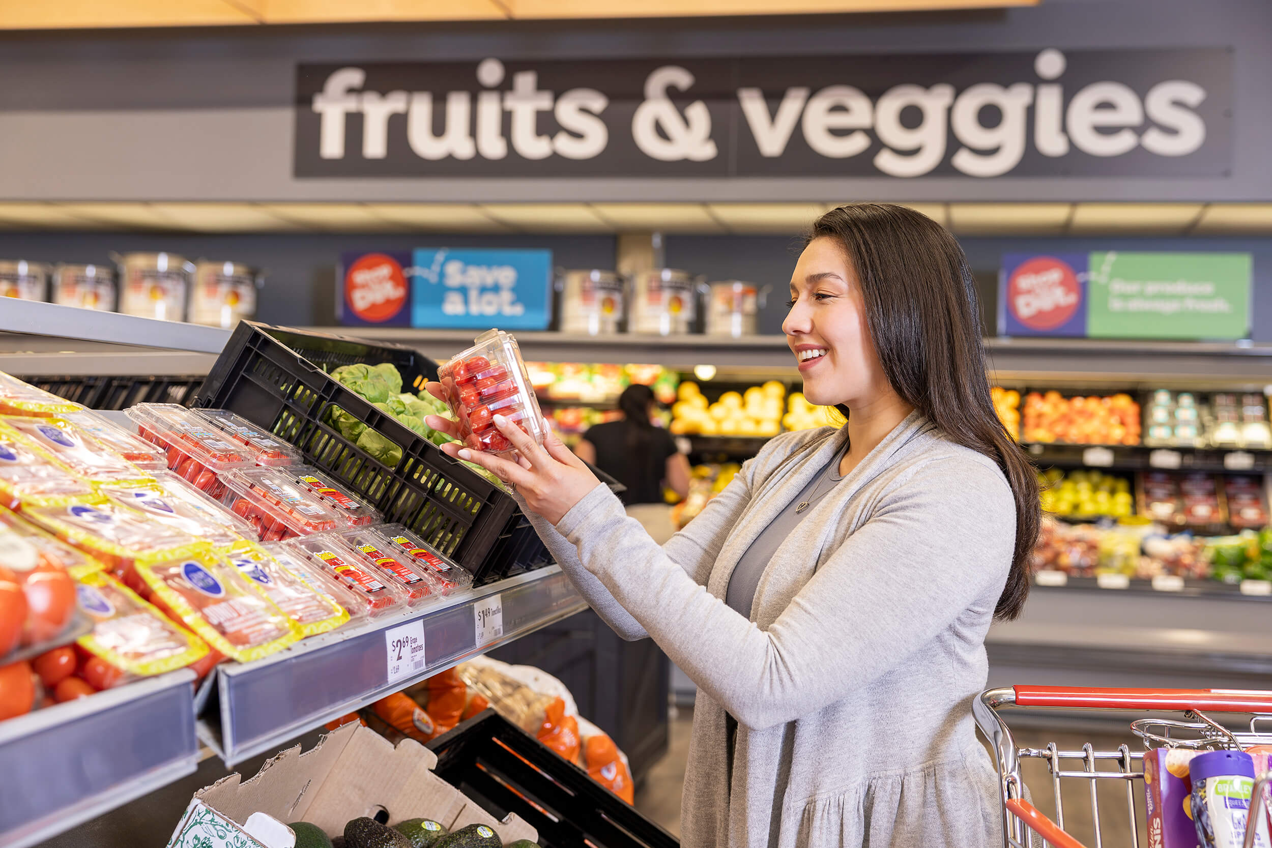 woman looking at groceries