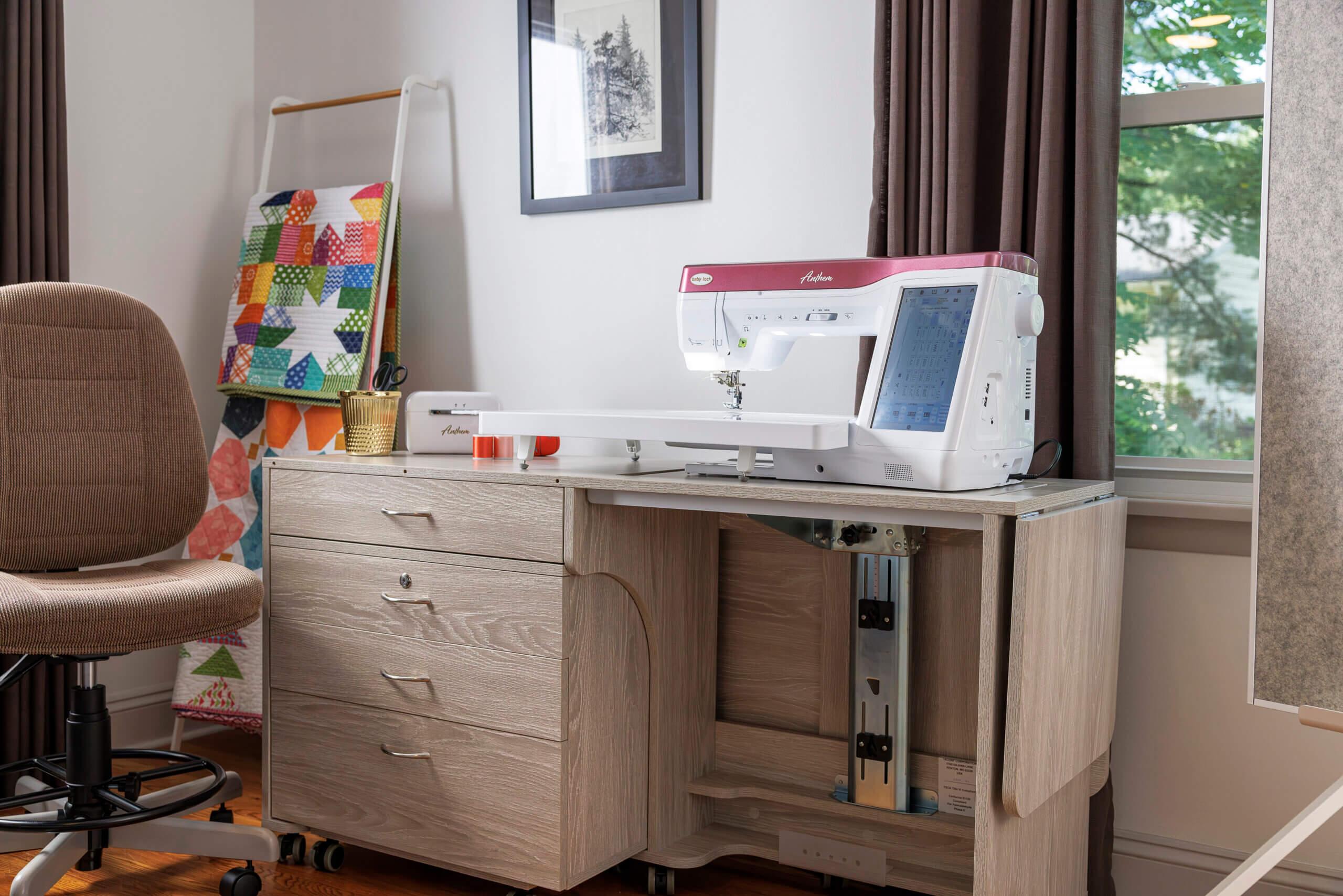 room with sewing machine and table